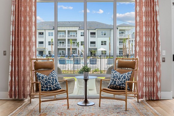 Clubhouse with modern design at Coastal Exchange Apartments offering luxury amenities for residents' enjoyment