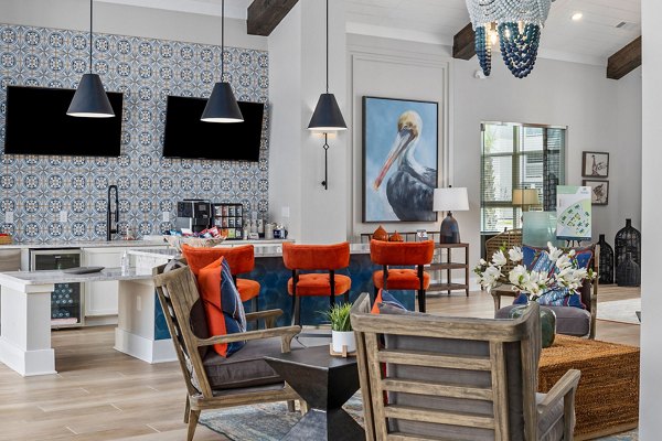Spacious clubhouse with modern decor at Coastal Exchange Apartments