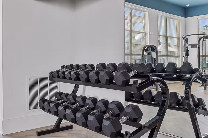 State-of-the-art fitness center at Coastal Exchange Apartments offering premium workout equipment