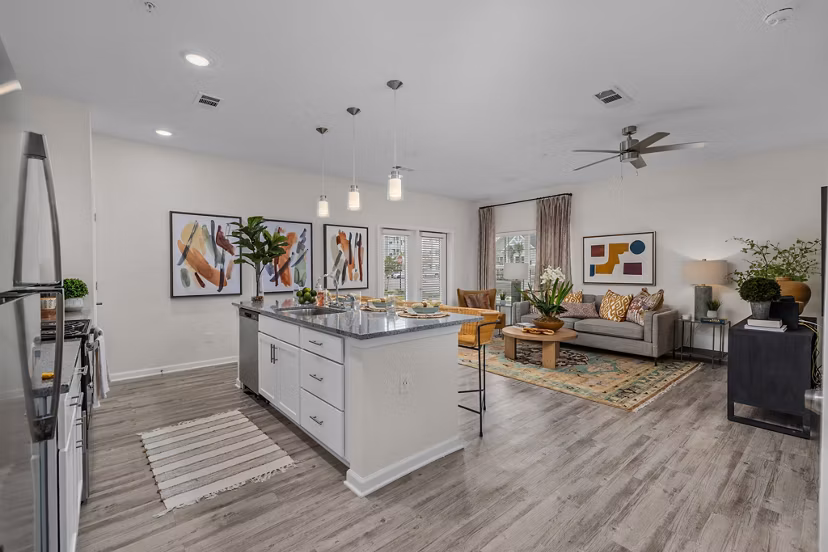 Modern kitchen with stainless steel appliances at Coastal Exchange Apartments near the beach