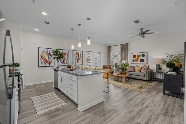 Modern kitchen with stainless steel appliances at Coastal Exchange Apartments near the beach