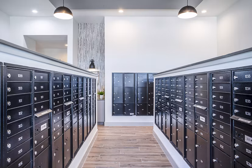 Clubhouse mail room with modern design at Prose Vista West Apartments, offering a convenient package service for residents