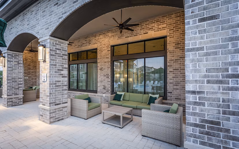 Spacious outdoor patio with modern seating at Prose Vista West Apartments, perfect for relaxing and social gatherings
