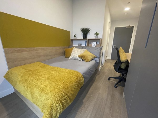 bedroom at Hillfort House Apartments