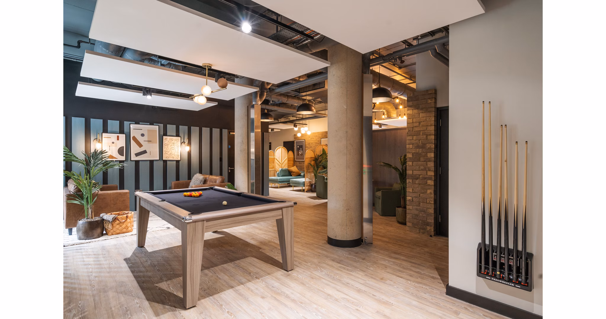 clubhouse game room at Hillfort House Apartments