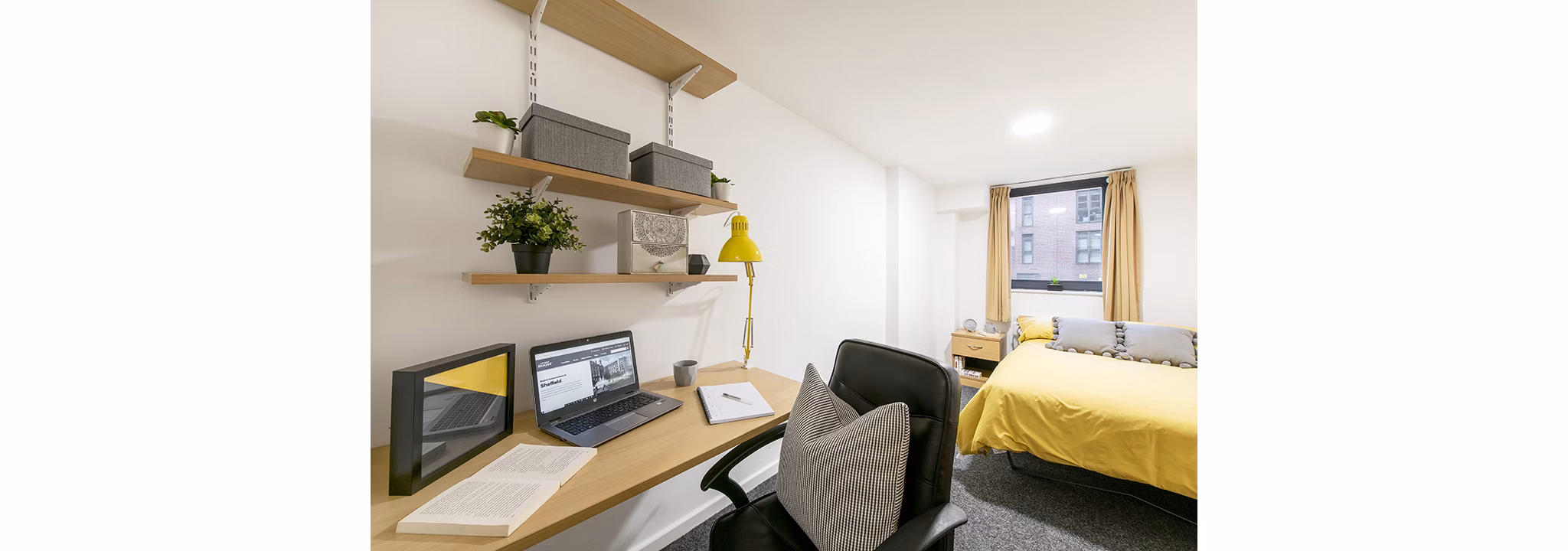 desk and bed at Central Place