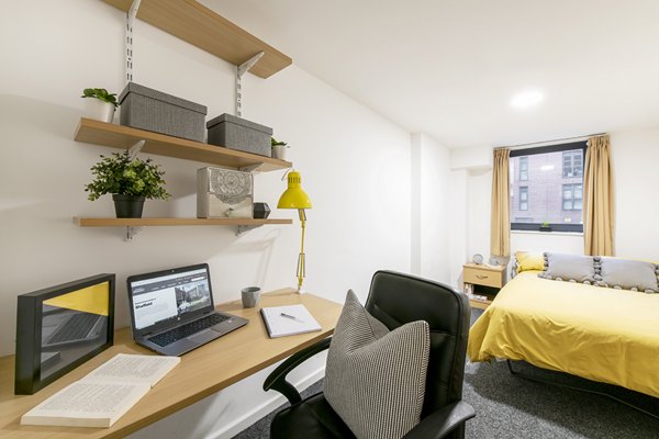 desk and bed at Central Place