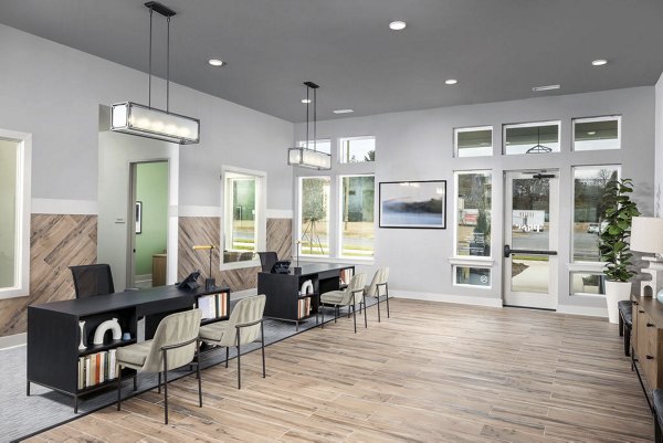 Clubhouse featuring modern design and vibrant seating at Prose Rhyne Apartments