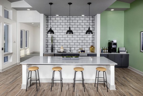 Stylish clubhouse with modern decor at Prose Rhyne Apartments in Charlotte