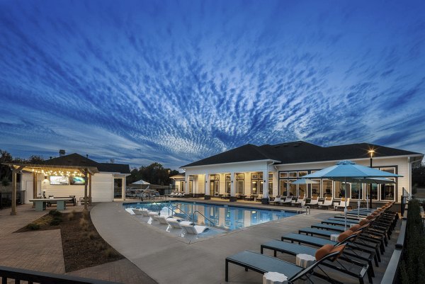 Sparkling outdoor pool at Prose Rhyne Apartments, a luxurious amenity for leisure and relaxation in a vibrant living community