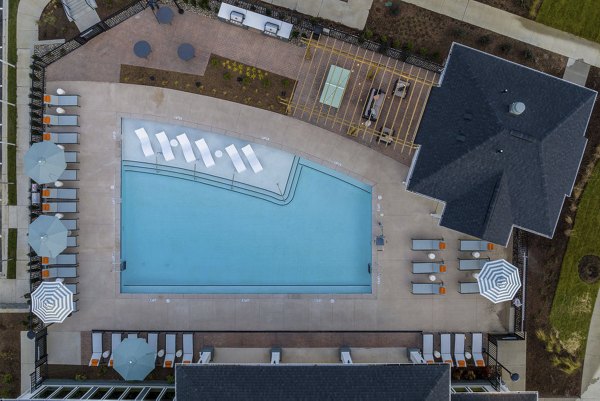 Prose Rhyne Apartments: Scenic view of modern luxury apartments surrounded by lush greenery