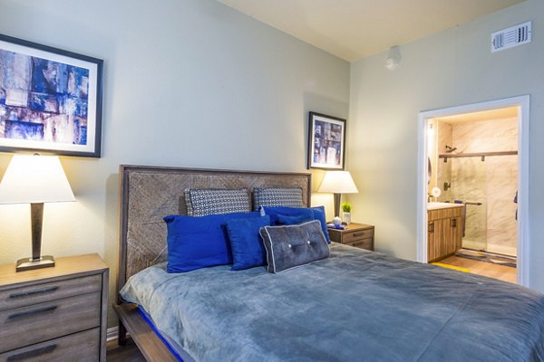 Spacious bedroom with modern decor in 4001 Midtown Apartments