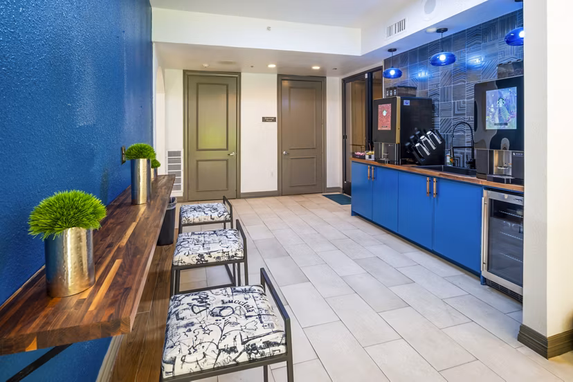 Clubhouse featuring modern design and cozy seating at 4001 Midtown Apartments
