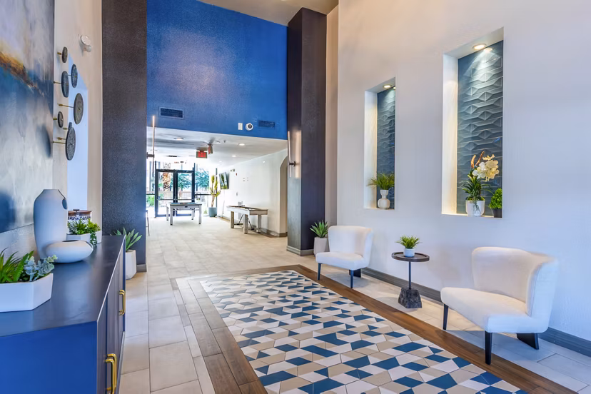 Clubhouse featuring modern furnishings and entertainment spaces at 4001 Midtown Apartments