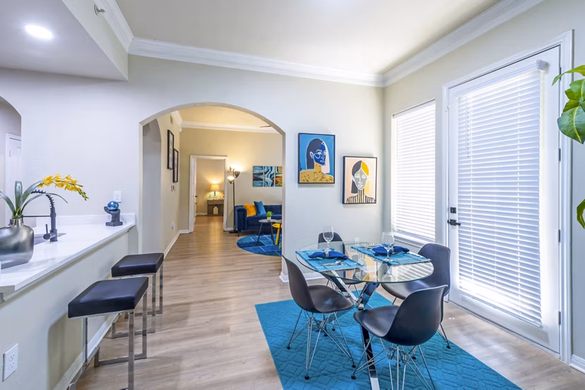 Elegant dining room with contemporary furnishings at 4001 Midtown Apartments, perfect for hosting dinners in style