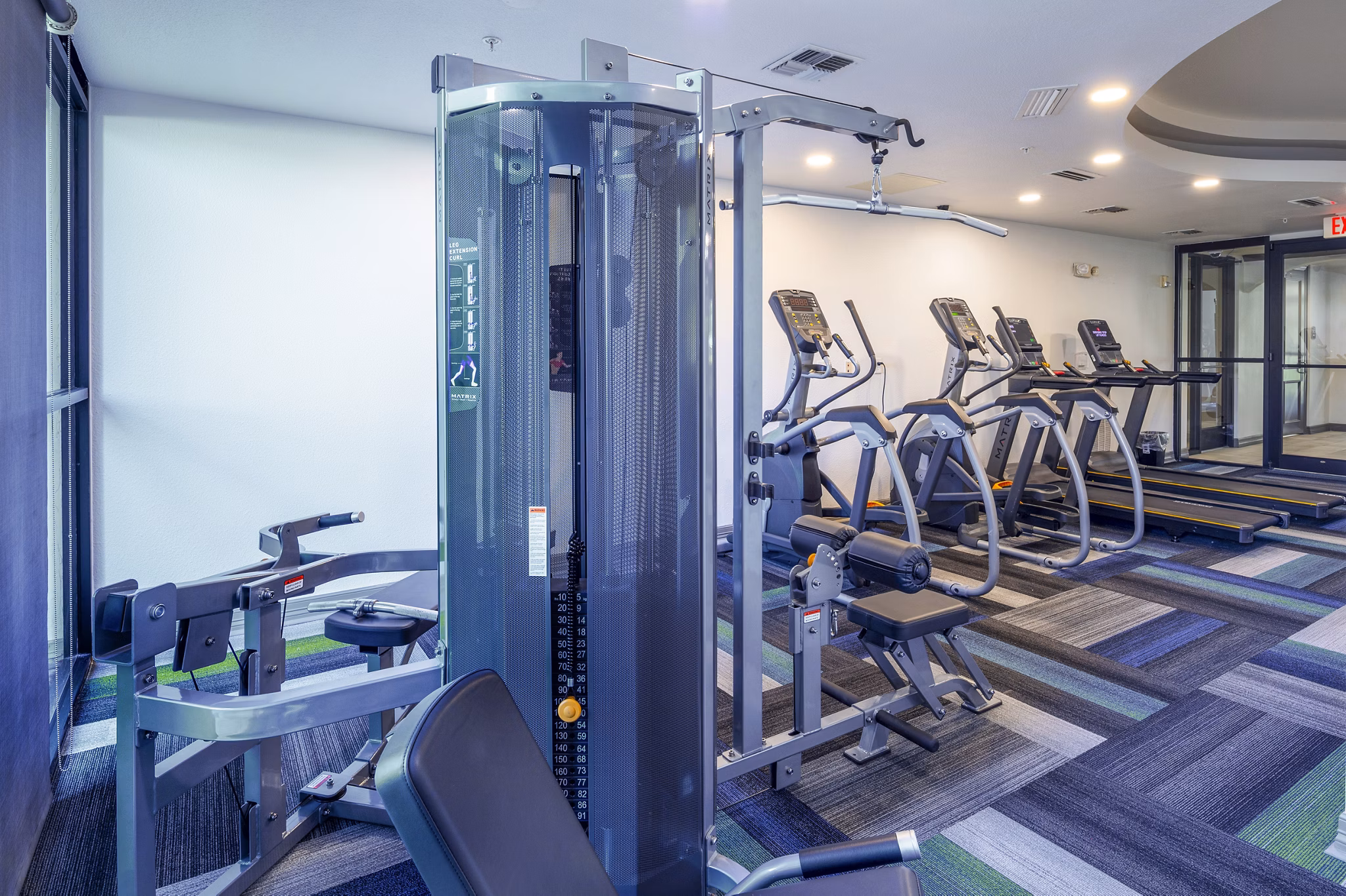 Fitness center with modern equipment at 4001 Midtown Apartments