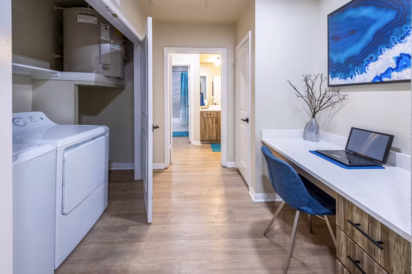 Home office and laundry room featuring modern decor at 4001 Midtown Apartments