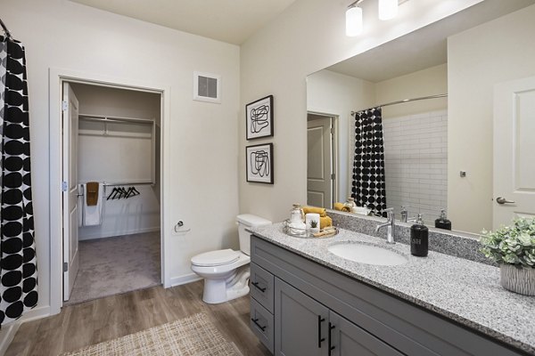 Modern bathroom with sleek fixtures and elegant tile design at Prose Desert River Apartments in luxury community setting