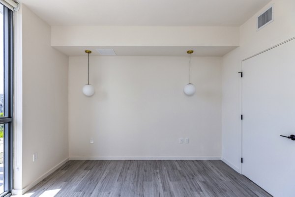 Cozy bedroom with modern decor at Metro Edgewater Apartments