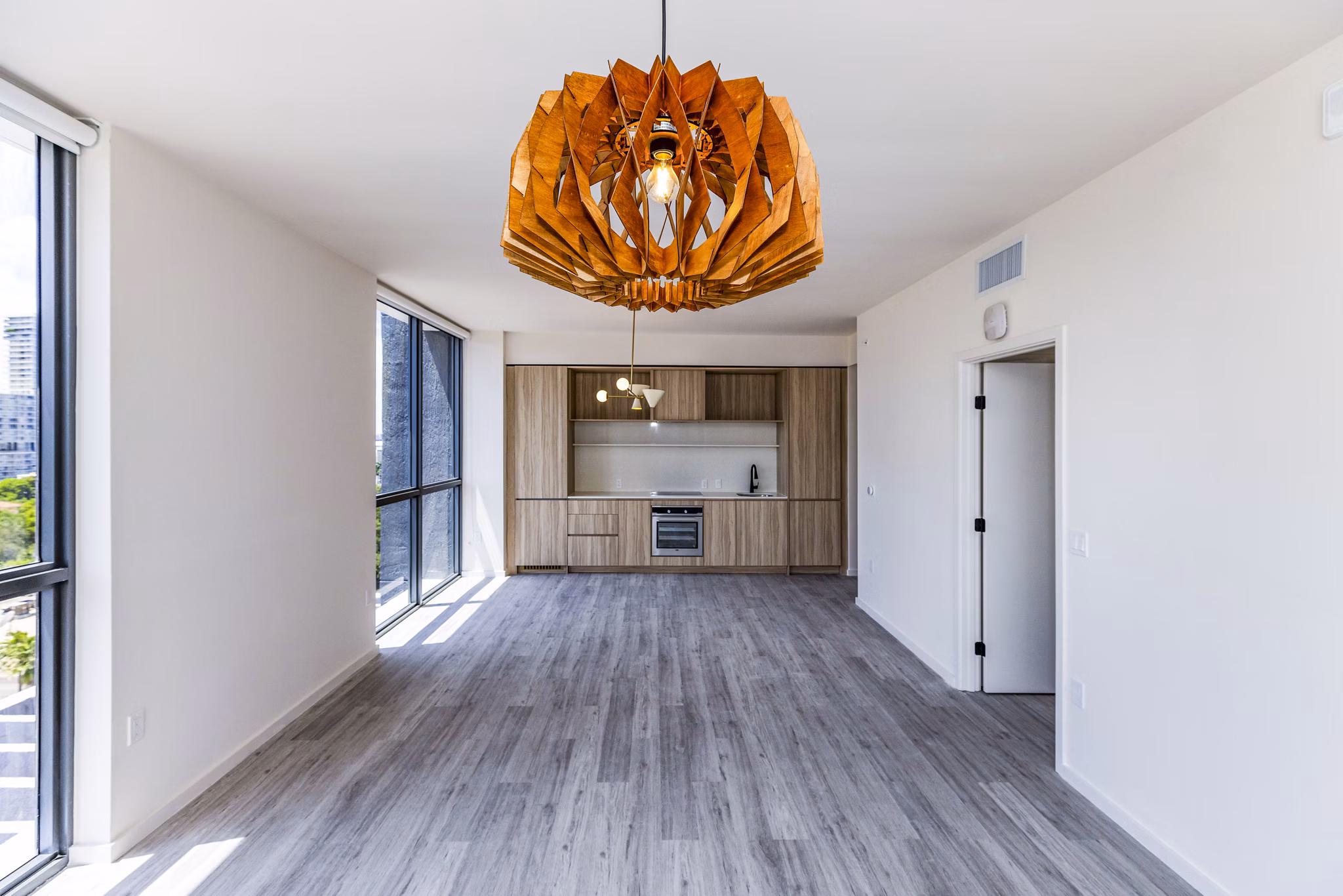 Spacious living room with modern decor at Metro Edgewater Apartments