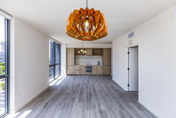 Spacious living room with modern decor at Metro Edgewater Apartments