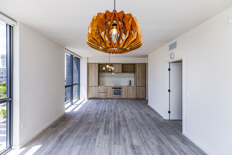 Spacious living room with modern decor at Metro Edgewater Apartments