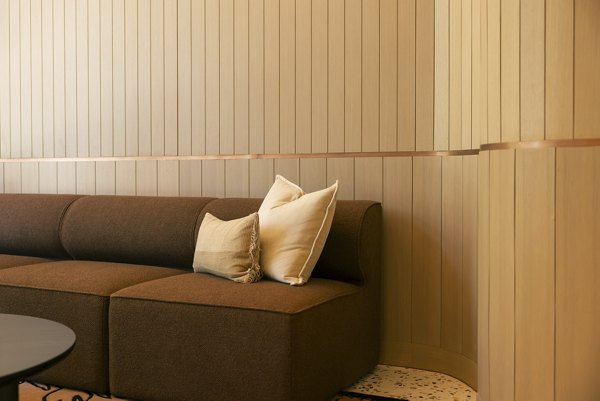 Modern clubhouse at The Waller Apartments with plush seating and entertainment areas, providing a luxurious social space for residents