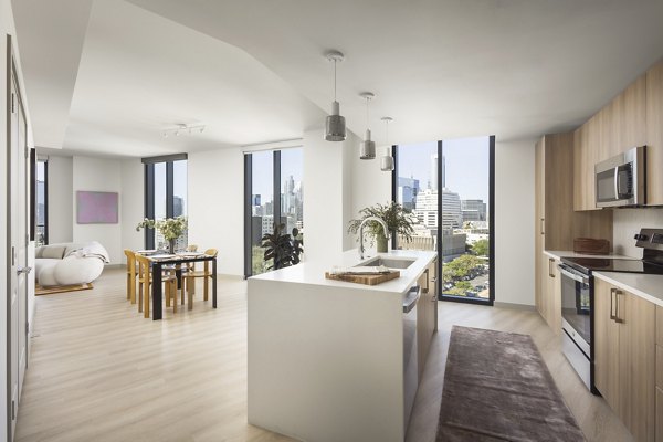 Contemporary kitchen with modern fixtures at The Waller Apartments in Austin