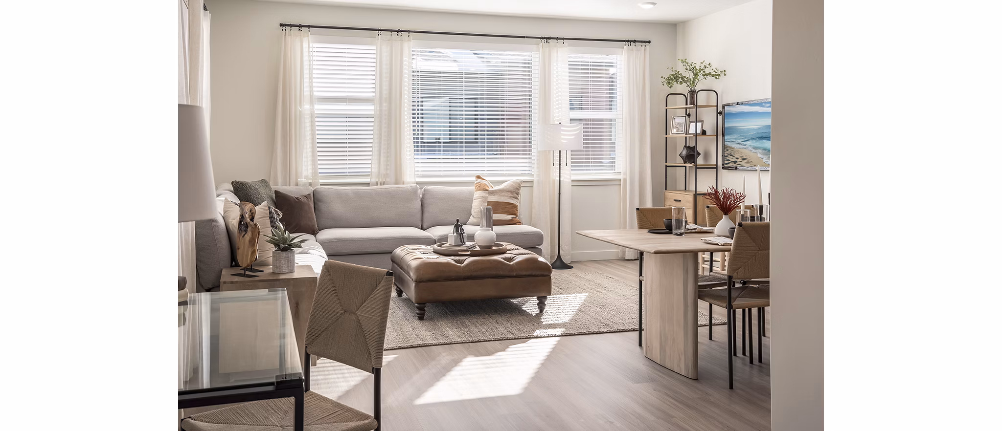 Open-plan kitchen with granite countertops and stainless steel appliances in San Fernando Building Apartments