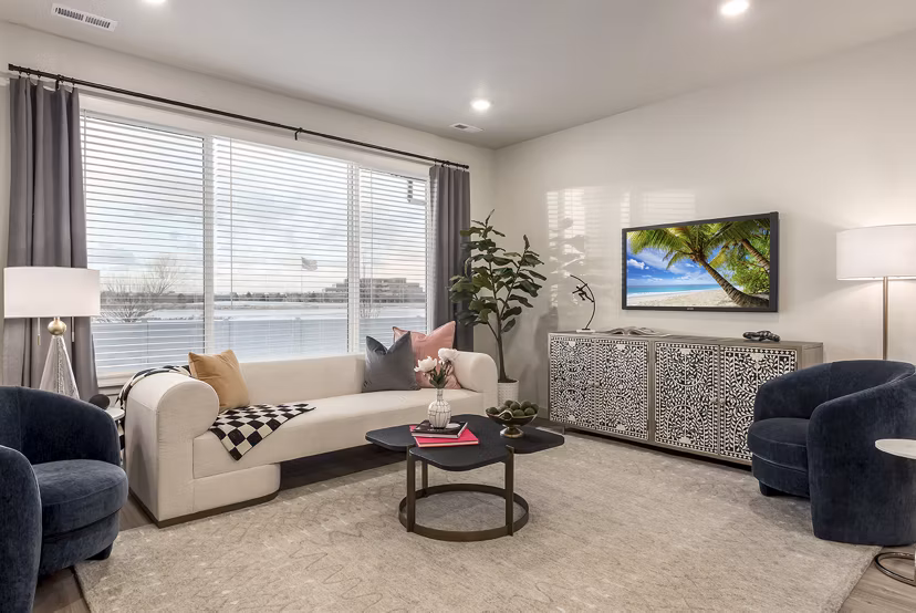 Spacious living room with contemporary design at H2O Townhomes Apartments