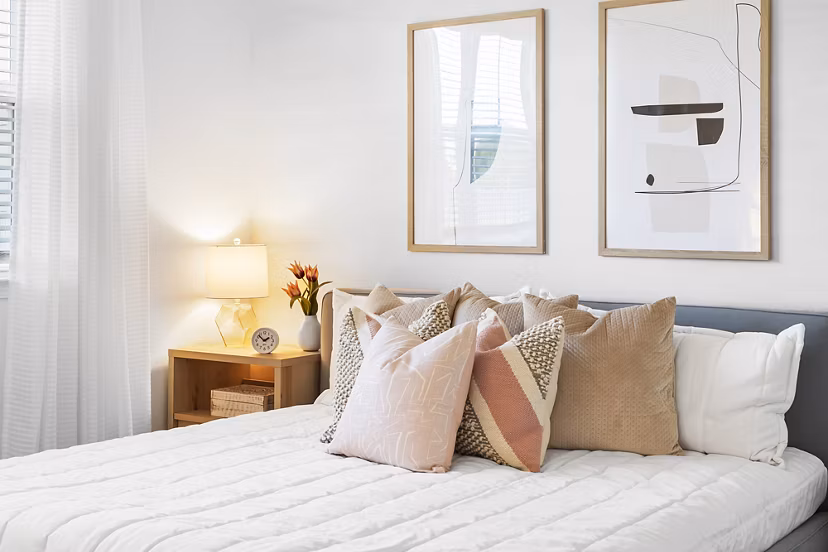 Cozy bedroom with stylish decor at Mira Crystal Lake Apartments