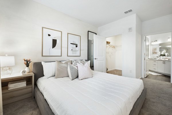 Luxurious bedroom with modern design elements at Mira Crystal Lake Apartments
