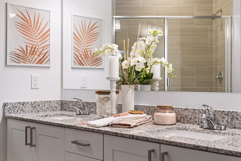 Mira Crystal Lake Apartments: Modern bathroom with elegant fixtures and marble countertops