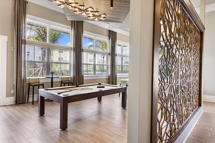 Clubhouse featuring modern lounge seating at Mira Crystal Lake Apartments