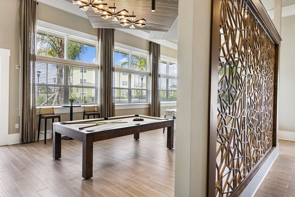 Clubhouse featuring modern lounge seating at Mira Crystal Lake Apartments