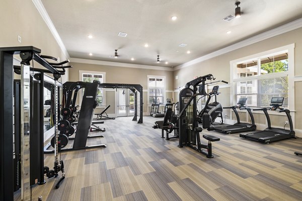 Modern fitness center with top-of-the-line equipment at Mira Crystal Lake Apartments