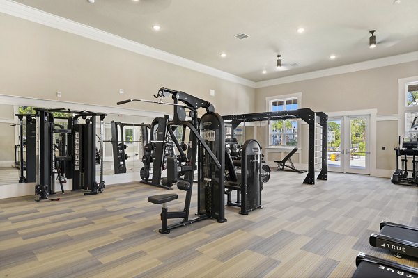 Fitness center with modern equipment at Mira Crystal Lake Apartments