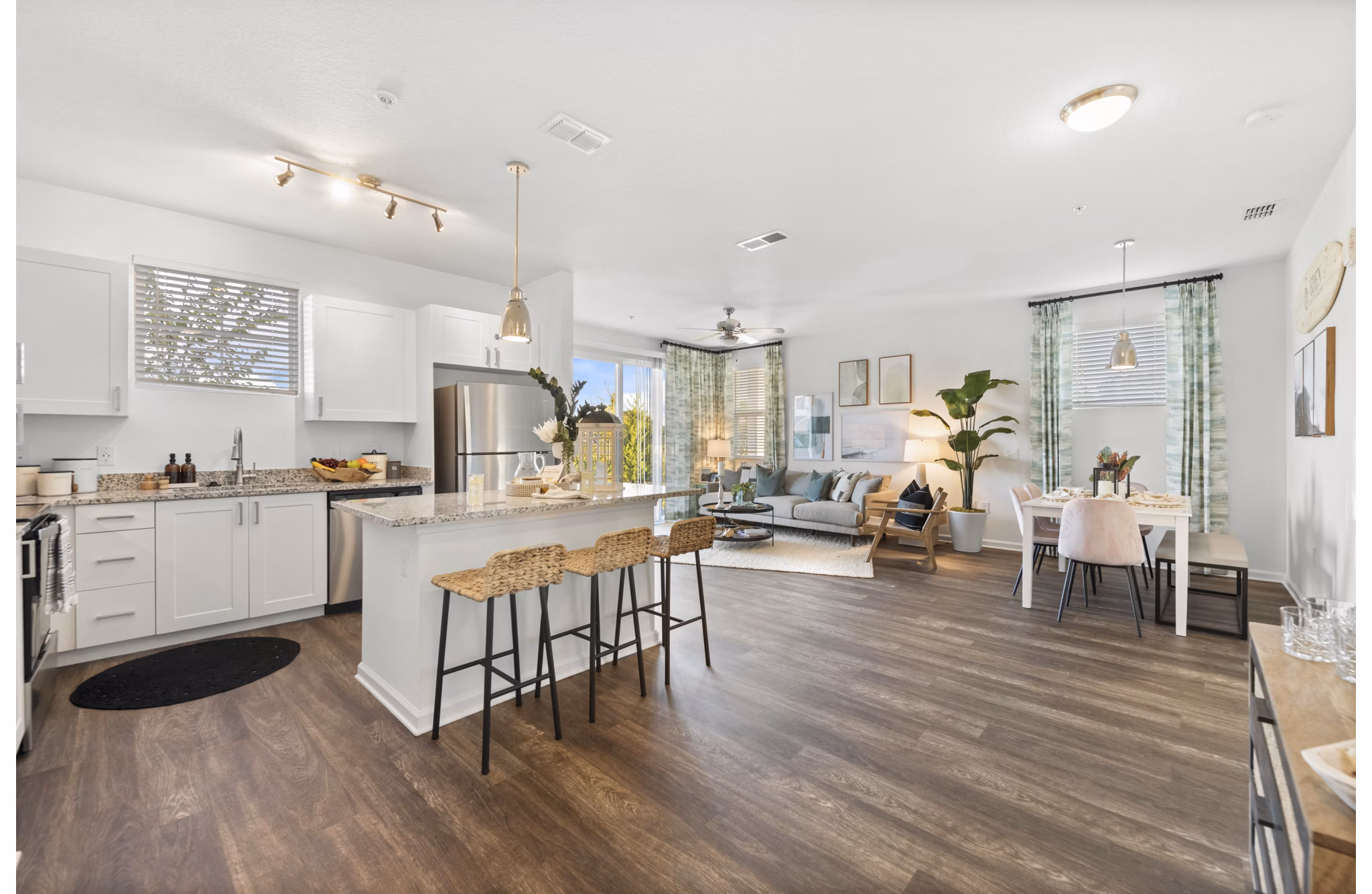 Modern kitchen featuring stainless steel appliances at Mira Crystal Lake Apartments