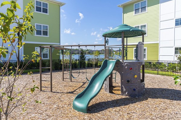 Playground featuring modern equipment at Mira Crystal Lake Apartments in a serene neighborhood