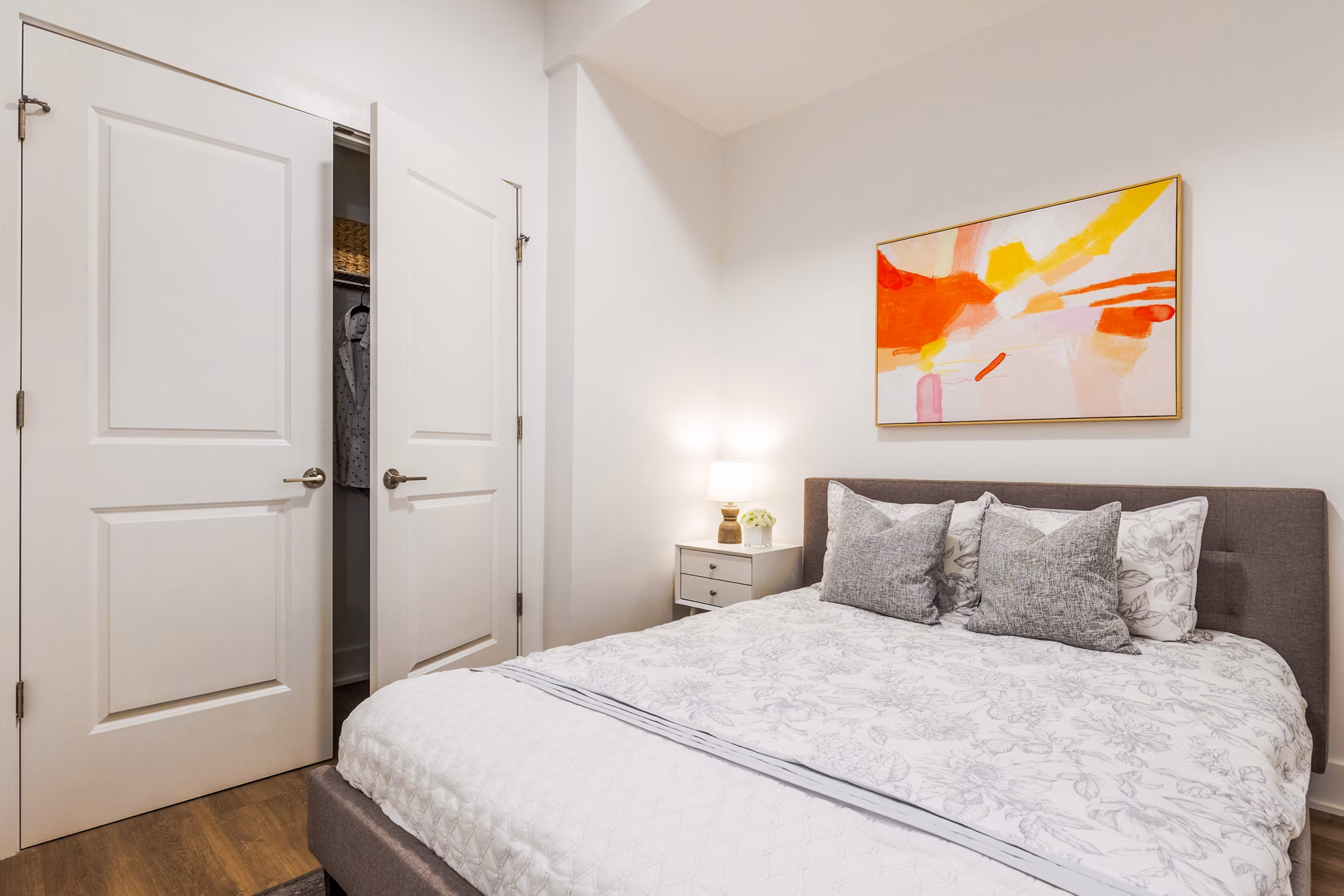 Spacious bedroom with modern decor at The Bedford Apartments