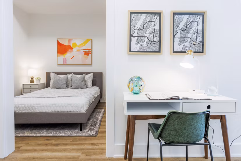 Spacious bedroom with modern decor at The Bedford Apartments