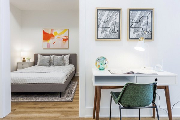 Spacious bedroom with modern decor at The Bedford Apartments