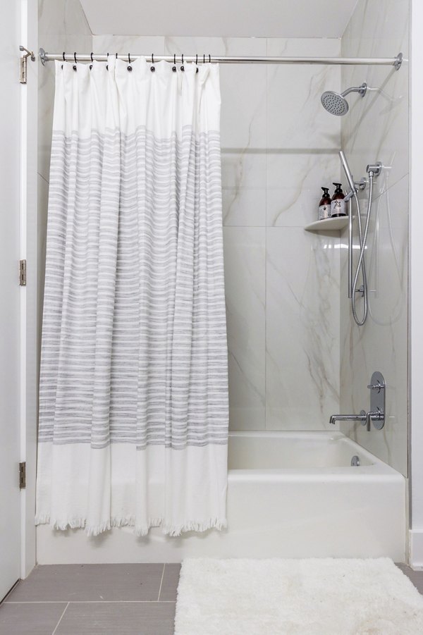 Modern bathroom featuring sleek fixtures at BELA Apartments