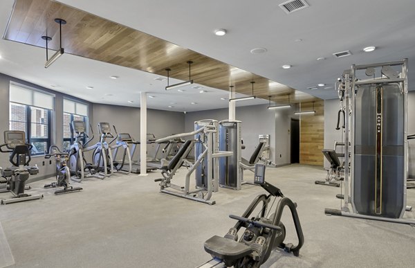 Modern fitness center with state-of-the-art equipment at BELA Apartments, Brooklyn