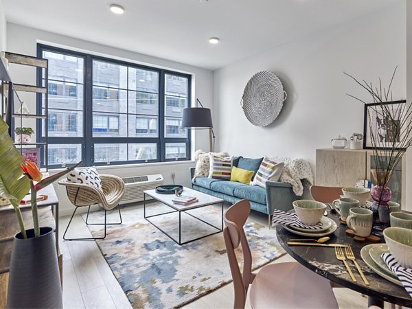 Modern living room with stylish decor at BELA Apartments, a Greystar luxury community