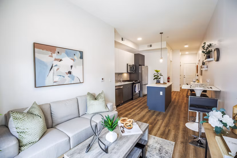 Spacious living room with modern decor in The Bedford Apartments luxury community
