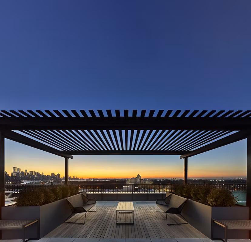 Scenic rooftop deck at BELA Apartments offering luxury relaxation spaces with ocean views in Brooklyn, ideal for Greystar residents