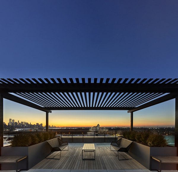 Scenic rooftop deck at BELA Apartments offering luxury relaxation spaces with ocean views in Brooklyn, ideal for Greystar residents