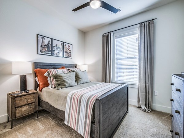 Luxury bedroom with plush bedding and modern decor in Vecina Apartment Villas