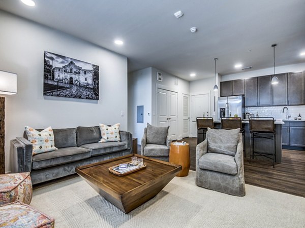 Modern living room with stylish decor at Vecina Apartment Villas, showcasing comfort and luxury for urban living